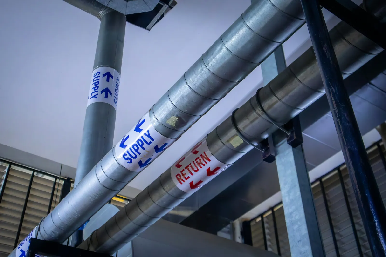 Metal ducts labeled supply and return