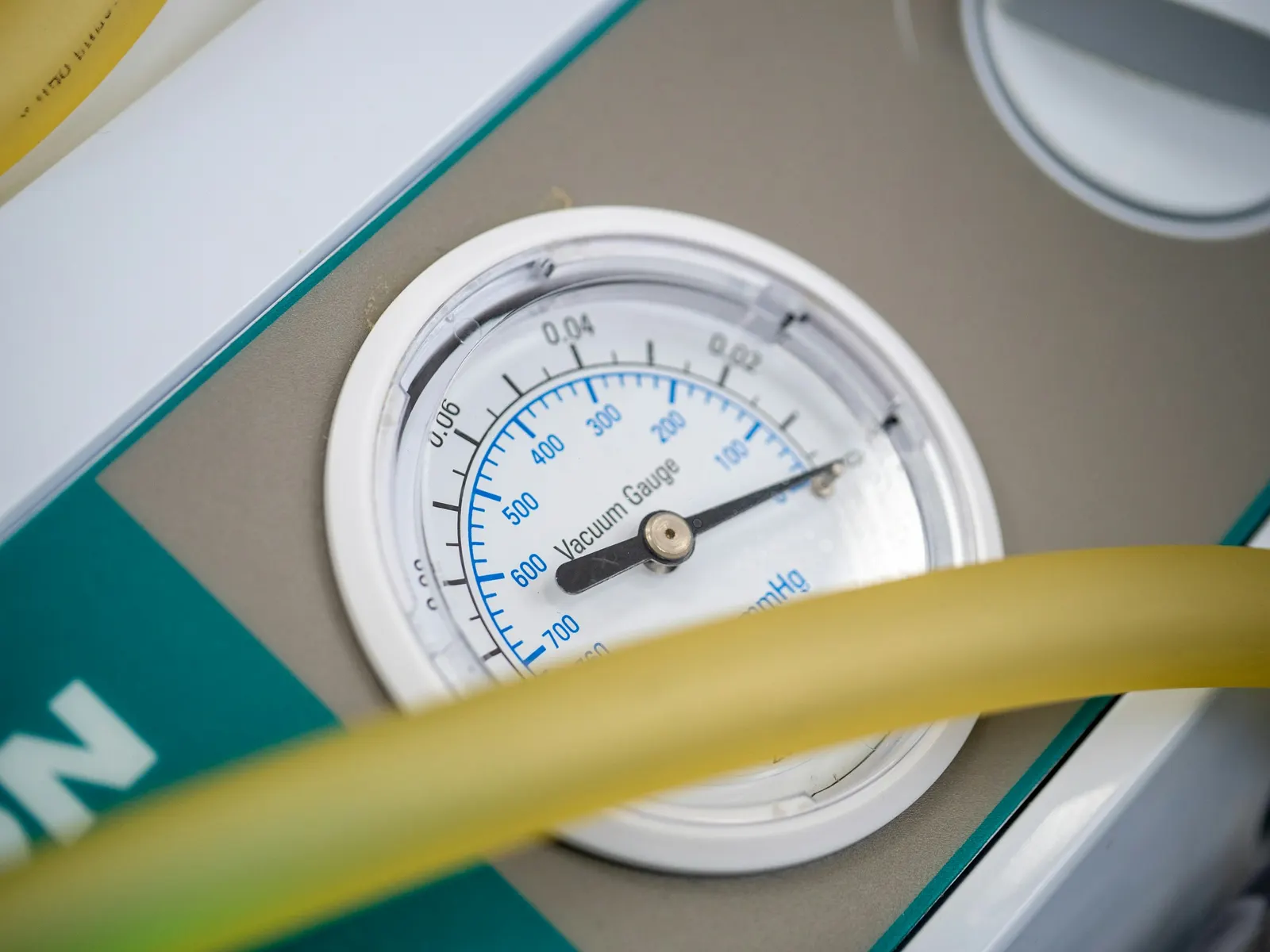 A refrigerant gauge set connected for service